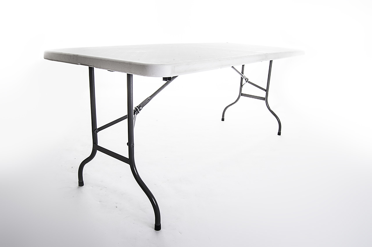 Sturdy 6' x 2'6'' blow mold plastic table with steel folding legs.- BE Event Hire